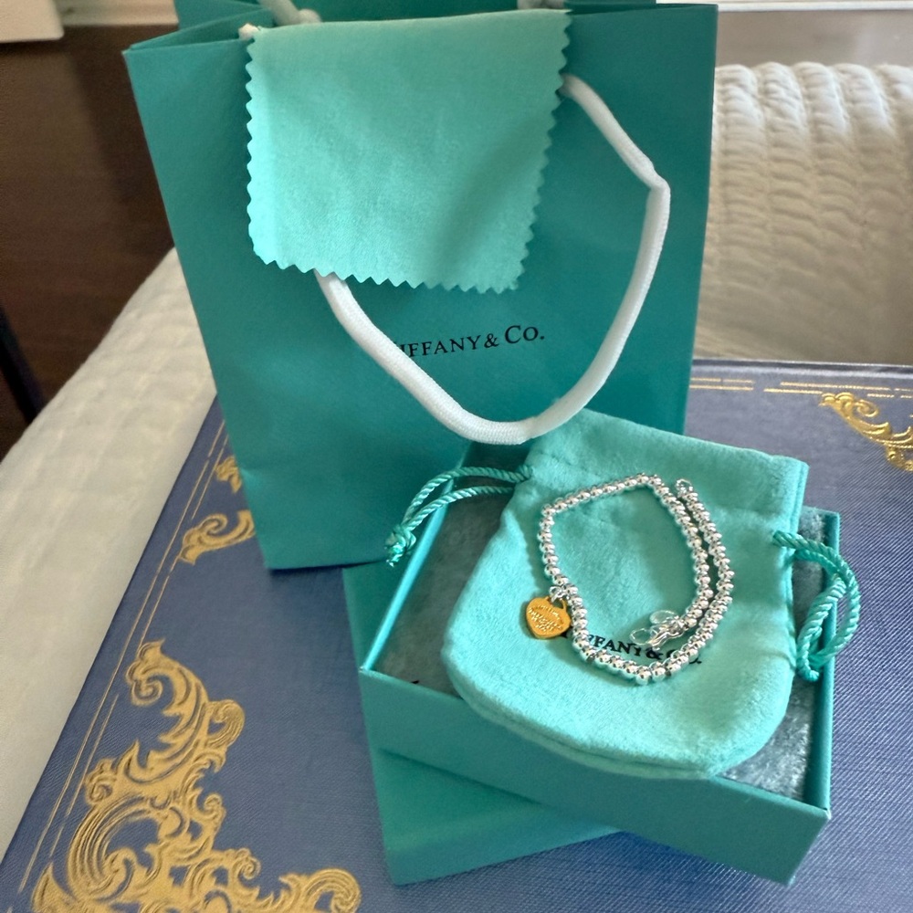 Copy- Tiffany & Co. Silver Bracelet with Gold Accent